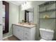 Bathroom features a double sink vanity with a shelf for storage at 108 Greenwood Ave, Belmont, NC 28012