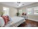 Relaxing bedroom with hardwood floors, lots of light, and neutral tones at 108 Greenwood Ave, Belmont, NC 28012