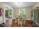 Inviting dining area with neutral walls, warm lighting, and a seamless transition to the living space, perfect for entertaining guests at 108 Greenwood Ave, Belmont, NC 28012