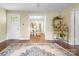 Spacious living room with hardwood floors, seamlessly connected to the dining area, creating an open and inviting living space at 108 Greenwood Ave, Belmont, NC 28012