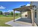 Backyard patio featuring a covered pergola with a grill, perfect for outdoor entertainment at 11101 Crane Creek Dr, Charlotte, NC 28278