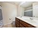 Bright bathroom featuring double sinks, a large mirror, and a shower with neutral-toned tile floors at 11101 Crane Creek Dr, Charlotte, NC 28278