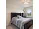 Bedroom with neutral walls, carpeted flooring, a ceiling fan, and a view at 11101 Crane Creek Dr, Charlotte, NC 28278