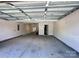 Clean, well-lit garage with ample space for vehicles and storage, ready for customization at 11101 Crane Creek Dr, Charlotte, NC 28278