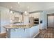Modern kitchen with stainless steel appliances and a granite island at 11101 Crane Creek Dr, Charlotte, NC 28278