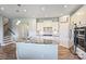 Gourmet kitchen boasts stainless appliances and granite countertops with island seating at 11101 Crane Creek Dr, Charlotte, NC 28278