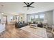 Comfortable living room featuring hardwood floors, recessed lighting, and stylish decor at 11101 Crane Creek Dr, Charlotte, NC 28278