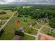 Aerial view of a house on a large lot surrounded by trees and fields at 1111 Lizzie Ln, Salisbury, NC 28147