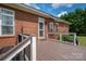Back deck offering great views with beautiful red brick wall at 1111 Lizzie Ln, Salisbury, NC 28147