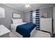 Cozy bedroom featuring a plush rug, matching curtains, and neutral decor at 1111 Lizzie Ln, Salisbury, NC 28147