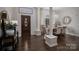 Elegant dining room with wood floors and sophisticated decor, ideal for entertaining guests at 1111 Lizzie Ln, Salisbury, NC 28147