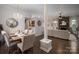 Open-concept dining and living room featuring stylish decor and plenty of natural light at 1111 Lizzie Ln, Salisbury, NC 28147