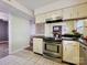 Charming kitchen with stainless steel oven, black countertops, and a bright, inviting atmosphere at 11718 Battery Pl, Charlotte, NC 28273