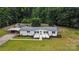 Aerial view of home with carport and fenced in backyard at 12382 Ritchie Rd, Midland, NC 28107