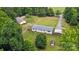 Aerial view of home and backyard with privacy fence at 12382 Ritchie Rd, Midland, NC 28107