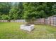 Backyard fire pit and privacy fence at 12382 Ritchie Rd, Midland, NC 28107
