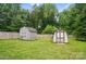 Backyard sheds with privacy fence at 12382 Ritchie Rd, Midland, NC 28107