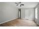 Bedroom featuring a ceiling fan, baseboard trim, and closet for storage, creating a serene retreat at 12382 Ritchie Rd, Midland, NC 28107