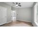 Bedroom with hardwood floors, ceiling fan, and natural light at 12382 Ritchie Rd, Midland, NC 28107