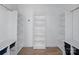 Walk-in closet featuring built-in shelving and storage solutions at 12382 Ritchie Rd, Midland, NC 28107