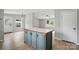 Open kitchen area with a center island and ample natural light at 12382 Ritchie Rd, Midland, NC 28107