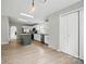 Well-lit kitchen with modern appliances, center island, and ample counter space at 12382 Ritchie Rd, Midland, NC 28107