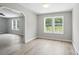 Open and airy room with lots of natural light and modern flooring at 12382 Ritchie Rd, Midland, NC 28107