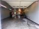 Spacious garage offering ample room for storage, with a workshop area and work bench at 1351 Hardin Rd, Dallas, NC 28034