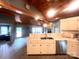 Bright kitchen featuring tiled flooring, white cabinetry, stainless appliances, and a wood vaulted ceiling at 1351 Hardin Rd, Dallas, NC 28034