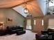 Bright living room with vaulted ceiling, large windows, and neutral decor, perfect for entertaining at 1351 Hardin Rd, Dallas, NC 28034