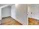 The attic space has hardwood floors and is well-lit from an adjoing room and can be used for storage at 13702 Tranquil Day Dr, Matthews, NC 28105