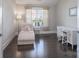 Comfortable bedroom with hardwood floors, neutral paint, desk area, and natural light at 148 Adelaide Way, Rock Hill, SC 29732