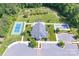 Aerial view of the community clubhouse with a tennis court, bocce ball and well-kept grounds at 148 Adelaide Way, Rock Hill, SC 29732