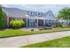Charming home exterior with well-manicured landscaping and a cozy fenced patio at 148 Adelaide Way, Rock Hill, SC 29732
