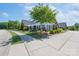 Stunning exterior view showcasing the meticulous landscaping and inviting patio area at 148 Adelaide Way, Rock Hill, SC 29732