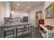 Bright kitchen with white cabinets, granite countertops, and stainless steel appliances, adjacent to dining area at 148 Adelaide Way, Rock Hill, SC 29732