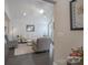 Bright living room with high ceilings, neutral furniture, and dark wood floors, creating an inviting space at 148 Adelaide Way, Rock Hill, SC 29732
