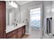 Bathroom features a single sink vanity and tub/shower combo at 15430 Waterfront Dr, Huntersville, NC 28078