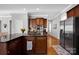 Eat-in kitchen with a stainless fridge and modern appliances at 15430 Waterfront Dr, Huntersville, NC 28078