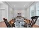 Cozy living room with hardwood floors, rocking chairs, and neutral paint at 15430 Waterfront Dr, Huntersville, NC 28078