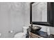 Stylish powder room with modern vessel sink and toilet at 15430 Waterfront Dr, Huntersville, NC 28078