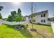 Expansive fenced backyard featuring a fire pit, bench, and garden, ideal for outdoor activities and relaxation at 1553 Arcadia Bluff Dr, York, SC 29745