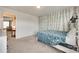Comfortable bedroom showcasing nature-themed wall art, a full-sized bed, and carpet at 1553 Arcadia Bluff Dr, York, SC 29745