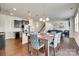 Open concept dining area leads to the kitchen, living room, and staircase at 1553 Arcadia Bluff Dr, York, SC 29745