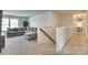 Upstairs loft area featuring carpeted floors, a large sectional sofa, and lots of natural light at 1553 Arcadia Bluff Dr, York, SC 29745