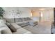 An upstairs loft features a gray sofa, carpet, and a wall decal at 1553 Arcadia Bluff Dr, York, SC 29745