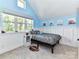 Bedroom featuring blue walls, ample natural light, carpeted floors, and a modern design at 167 Greenbay Rd, Mooresville, NC 28117