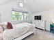 Bright bedroom with a large window, neutral walls, and a comfortable, inviting atmosphere at 167 Greenbay Rd, Mooresville, NC 28117
