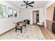 Spacious bonus room featuring a foosball table, natural light, neutral decor and hardwood flooring at 167 Greenbay Rd, Mooresville, NC 28117
