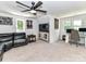 Spacious living room featuring a leather couch, and an entertainment center at 167 Greenbay Rd, Mooresville, NC 28117